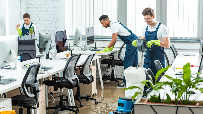 Day porter cleaning staff disinfecting office surfaces in Atlanta East